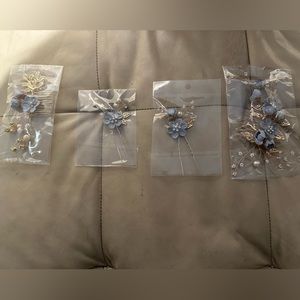 Various dusty blue/gold hair pieces